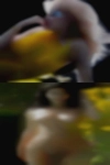 Naked woman shoving stuff